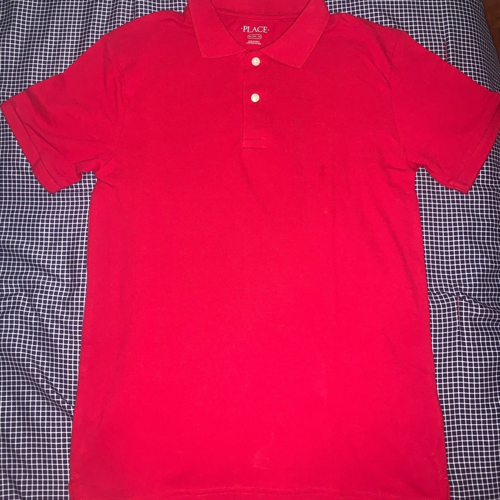 Red half button down shirt.
